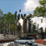 outside view of tall pine trees bracketing The Residences at Muskoka Bay