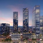 picture describes twighlight scene with tridel at the well condos in the background