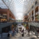 stunning retail glass atrium at the well allows for sunlight to enter this multi level space